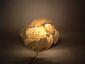 Thorsten Trenkel, Light in oval (2008), porcellana, metallo, luce elettrica, cm 68x48x12